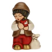 Bimbo con mela, personaggio del presepe classico Thun rosso Thun Presepe Natalizio