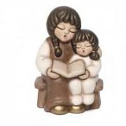COPPIA DI BIMBI CHE LEGGONO PRESEPE GIUBILEO THUN