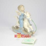 HERVIT BAMBINO SU CAVALLO A DONDOLO CM.8 Statuette in Porcellana Hervit