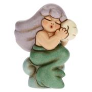 Sirena magica Thun all'ascolto con conchiglia 